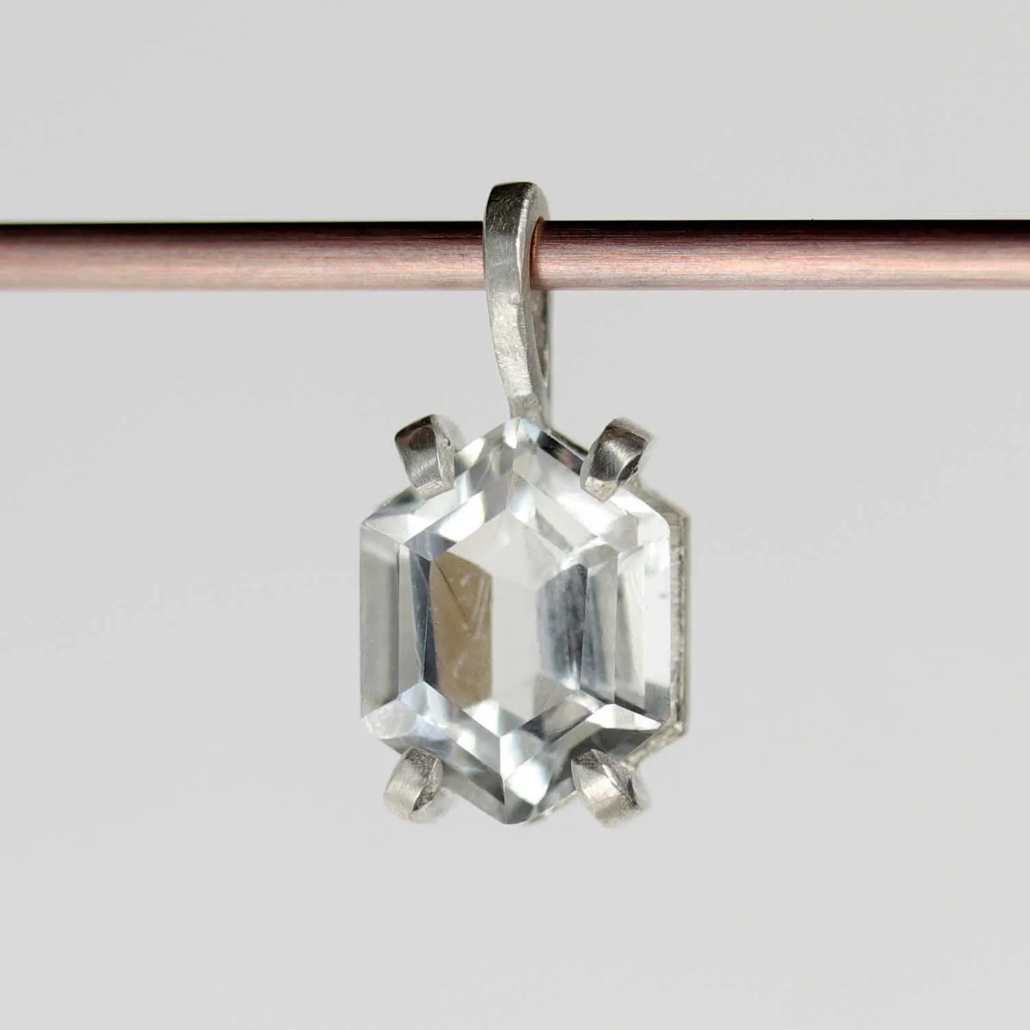 . Prong-set Silver and Hexagon Arkansas Quartz Pendant