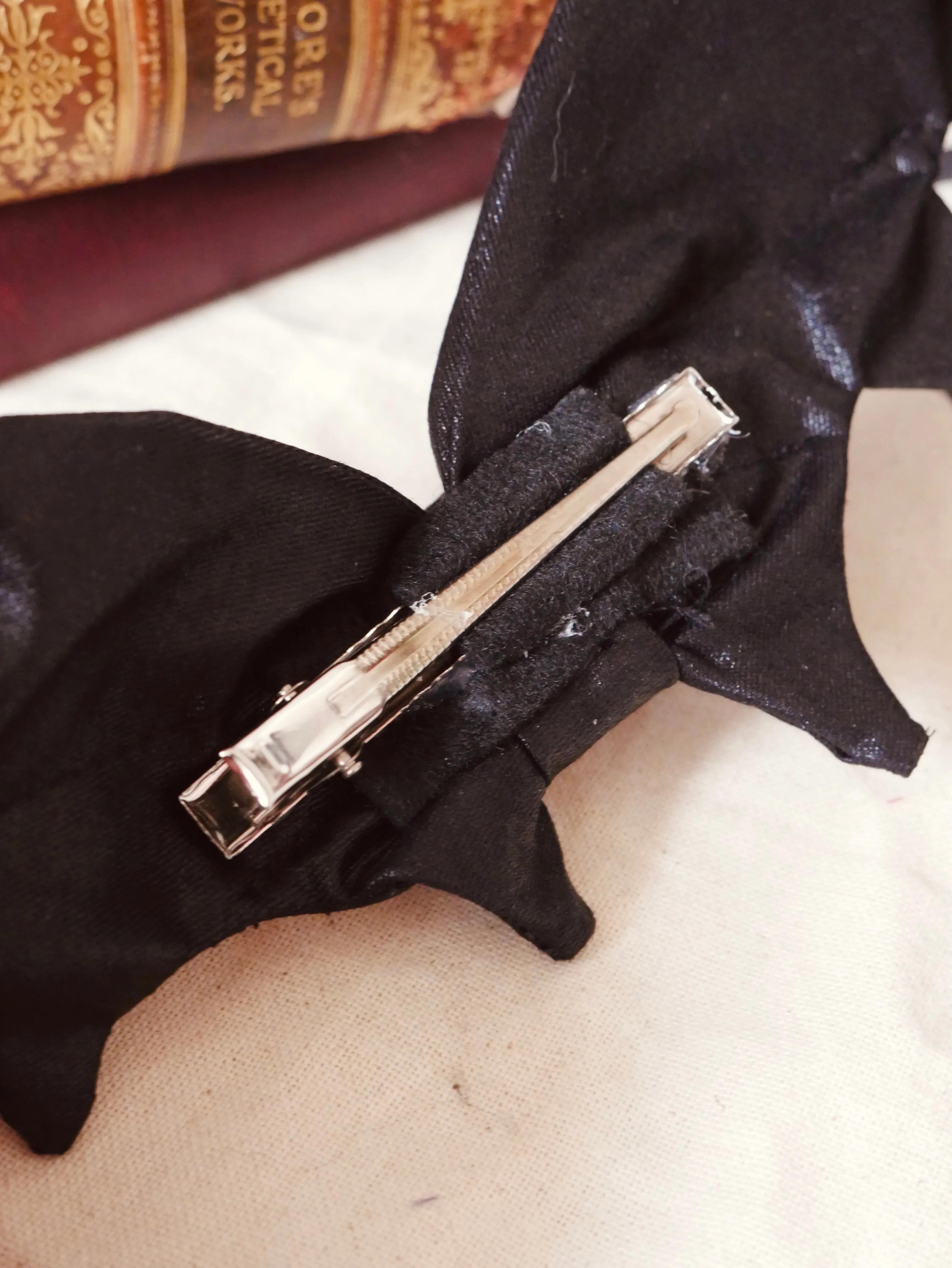 BAT BOW in Black Faux Leather