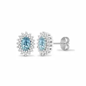 BLUE TOPAZ HALO STUD EARRINGS IN 9K WHITE GOLD