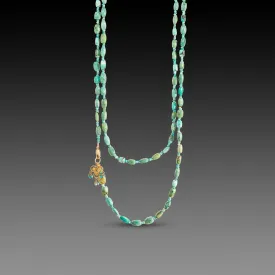 Long Turquoise Necklace with Gold Trio Charm